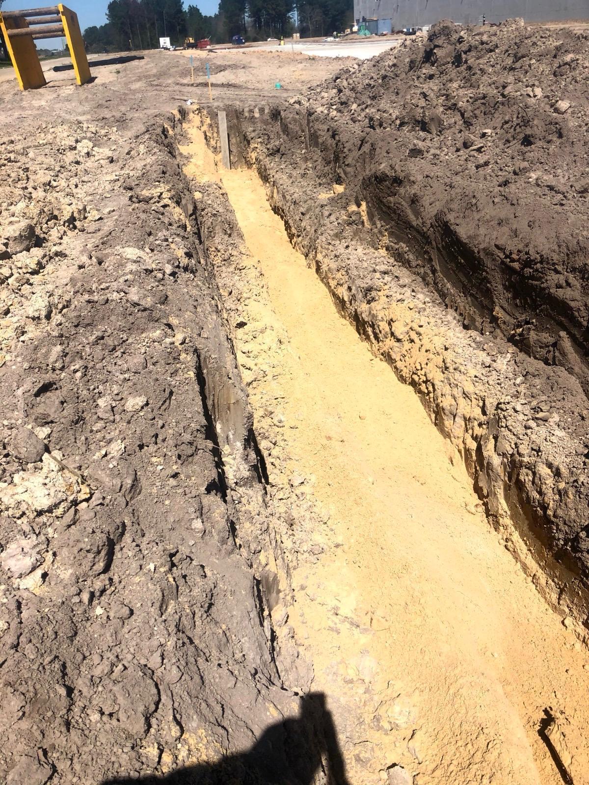 Bedded trench, sanded to grade